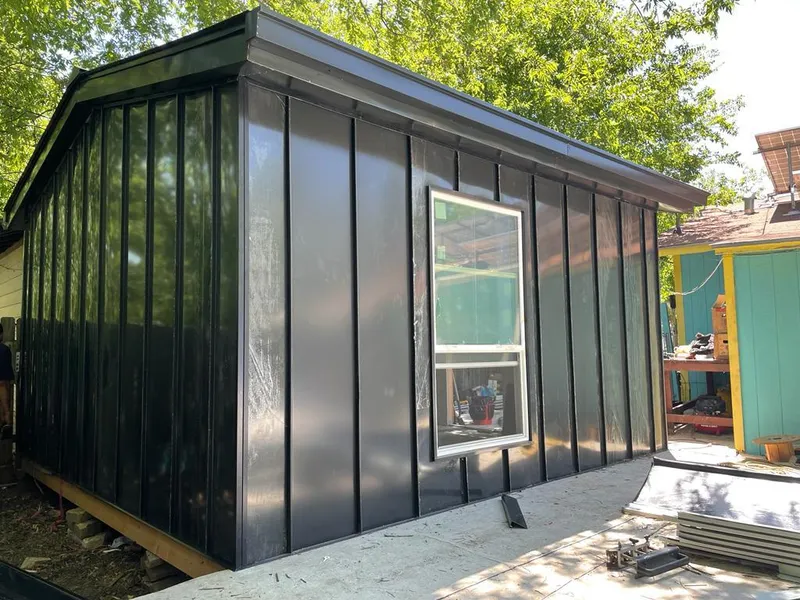 Black standing seam metal wall panels for Metal Roof Installation in Godfrey