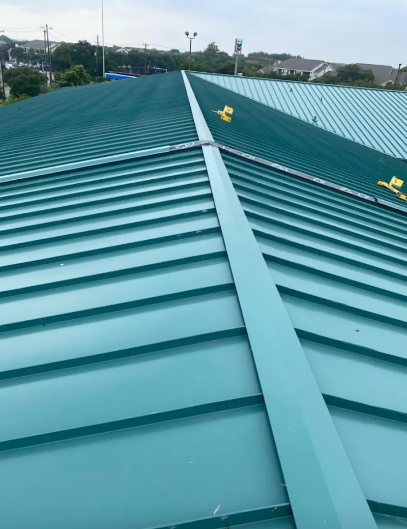 Green commercial metal roof ridge and valley for Metal Roof Repair in Godfrey